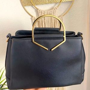 Black purse with gold details